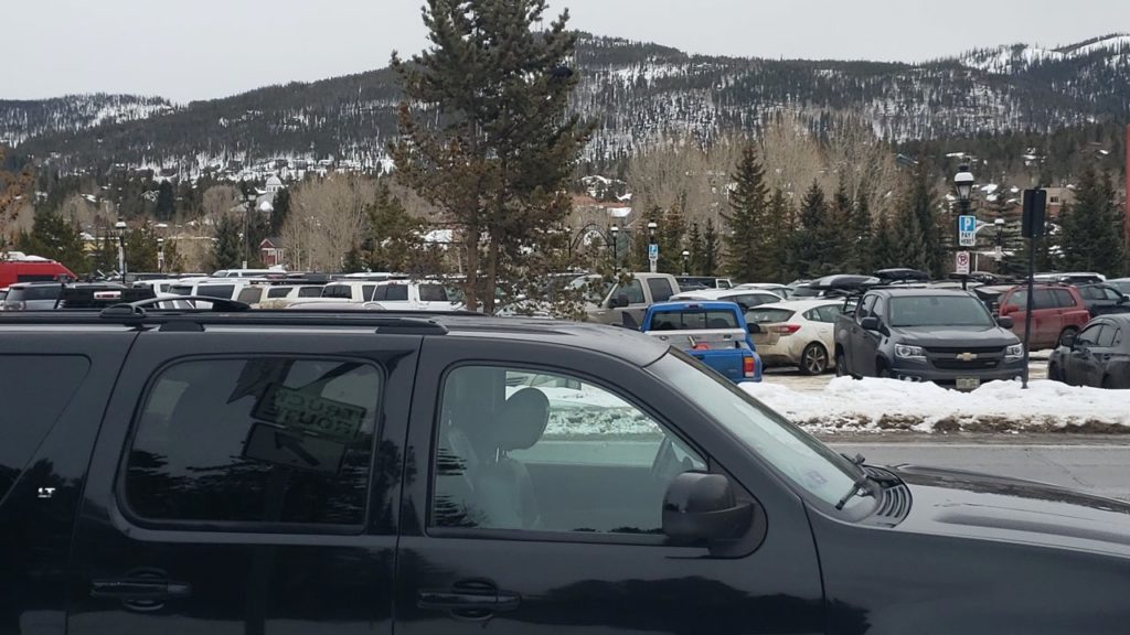 Black SUV at Breckenridge ski resorts main parking lot