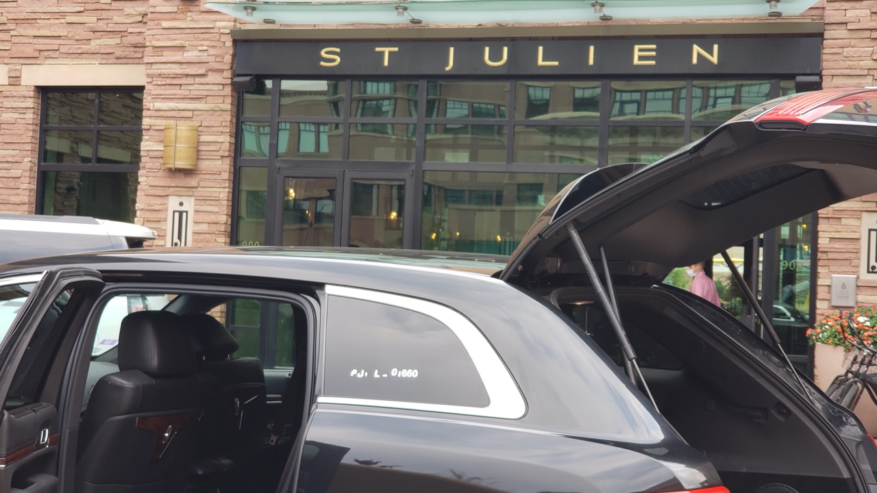 black sedan outside Sj Julien Hotel Boulder