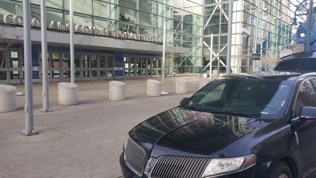 black car waiting for customer at Convention Center Denver